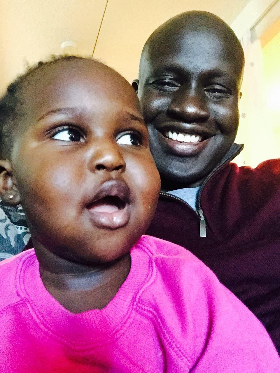 Aleer Deng and his daughter