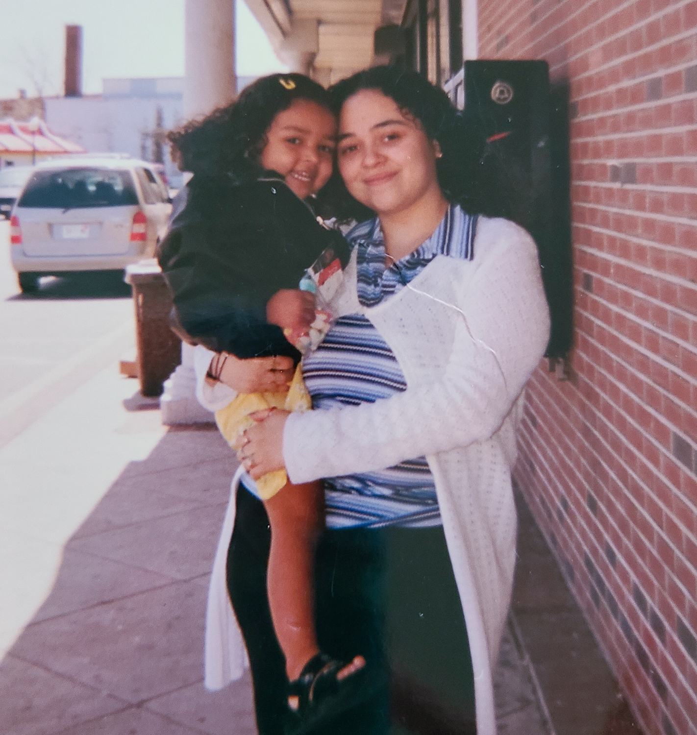 Carolina Vaszquez holds her yound daugther Dejah Morales