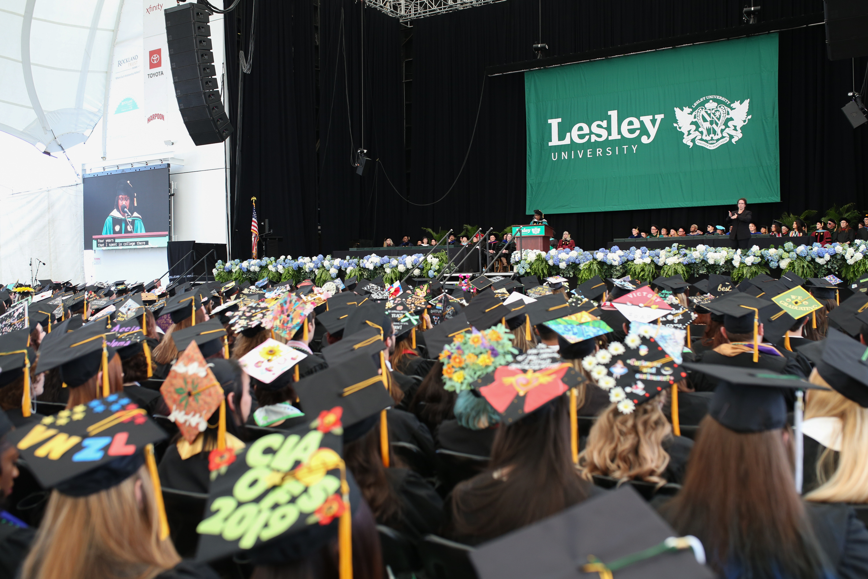 photo of audience and mortarboards at commencement