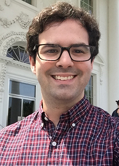 Alumnus Kevin DeCosta posing for a photo outside the White House