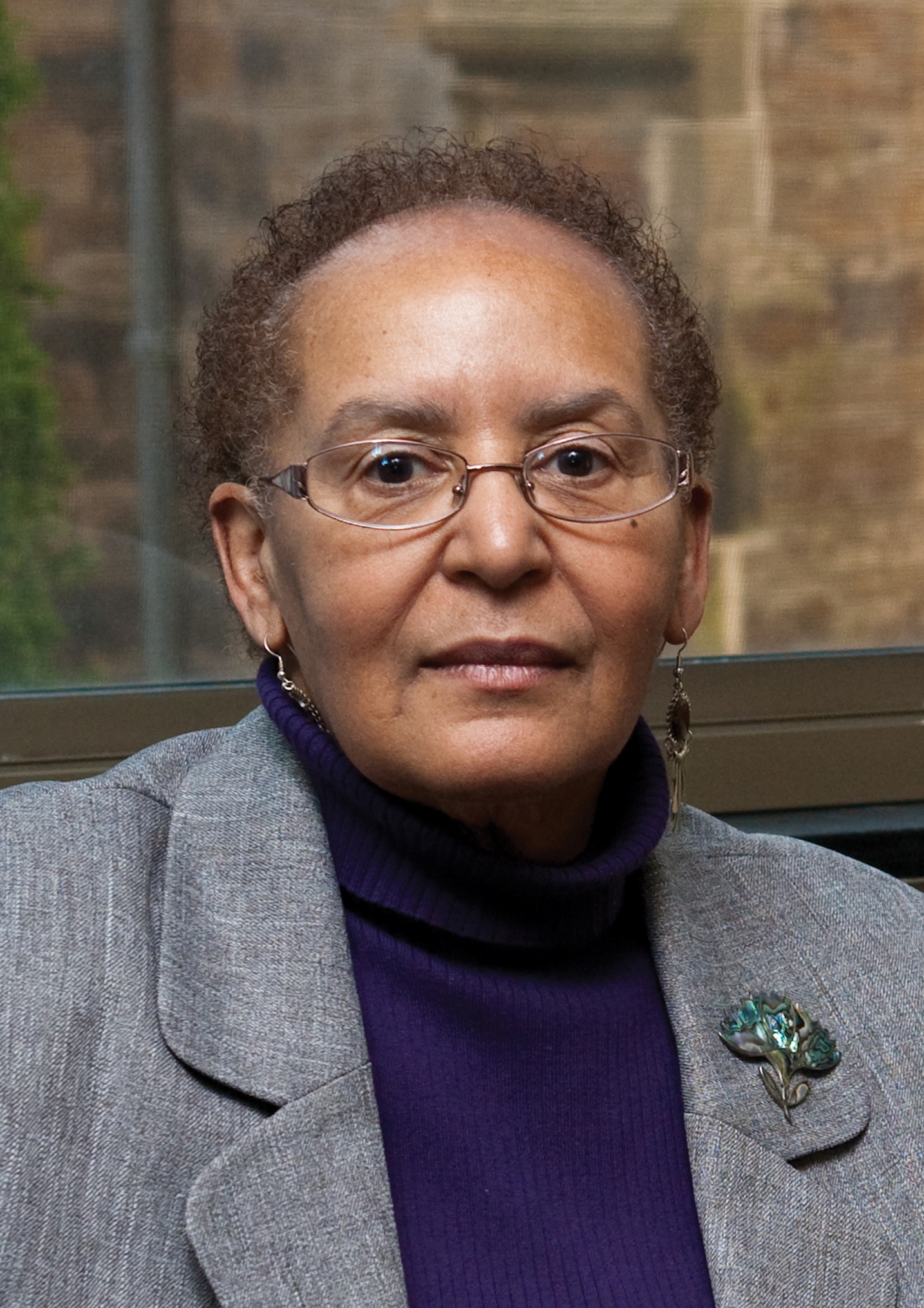 Patricia Payne sitting in Sherril Library