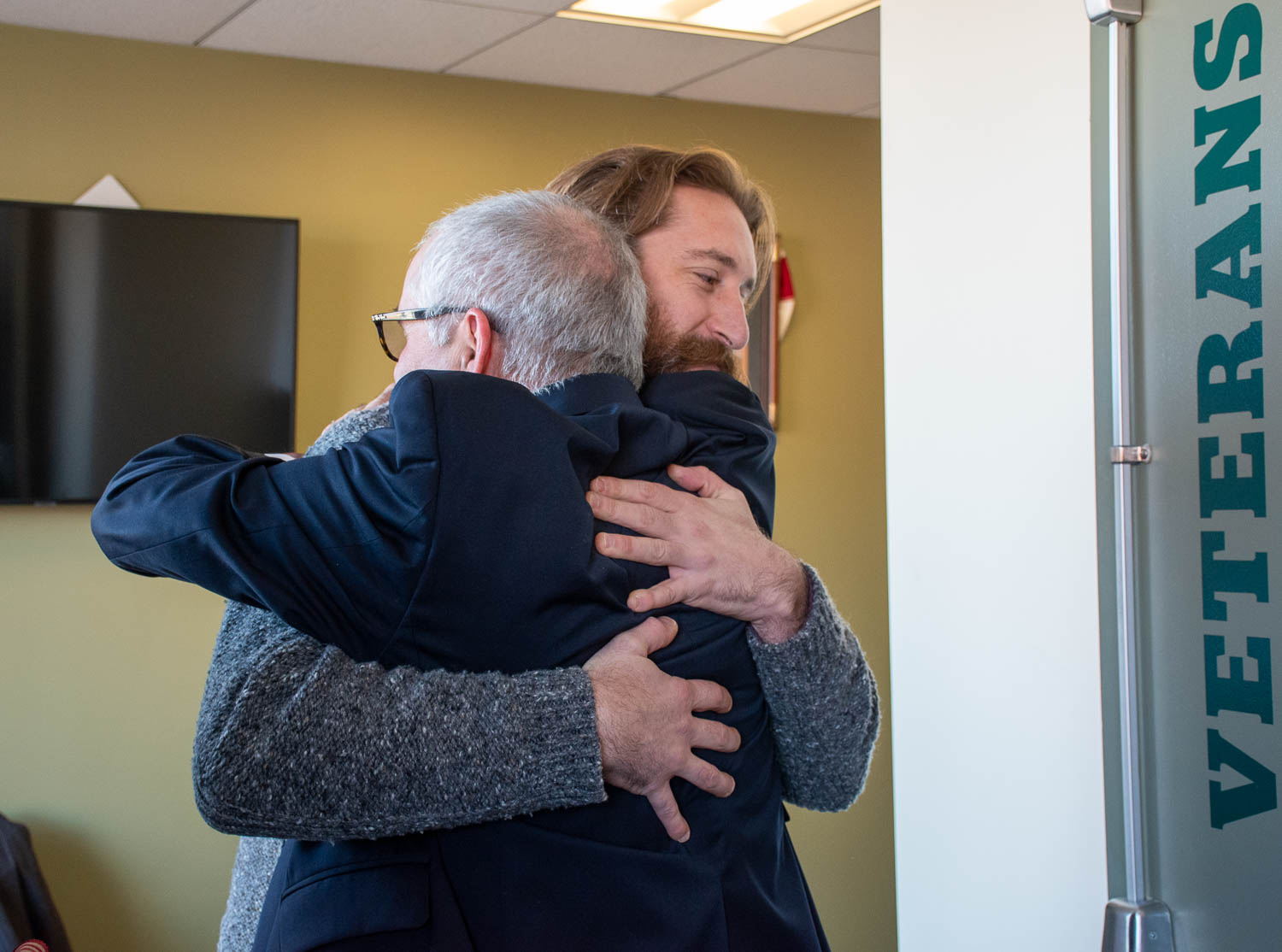 Gene and Erik hugging