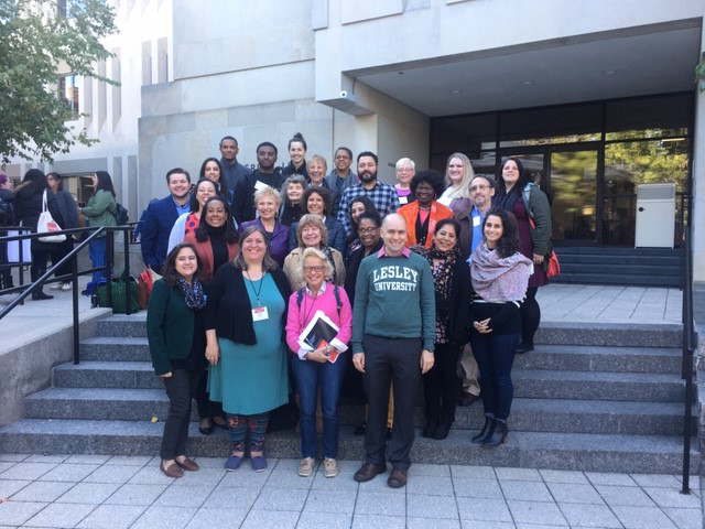 The Alumni Council stands on the steps outside of Sherrill Library. 