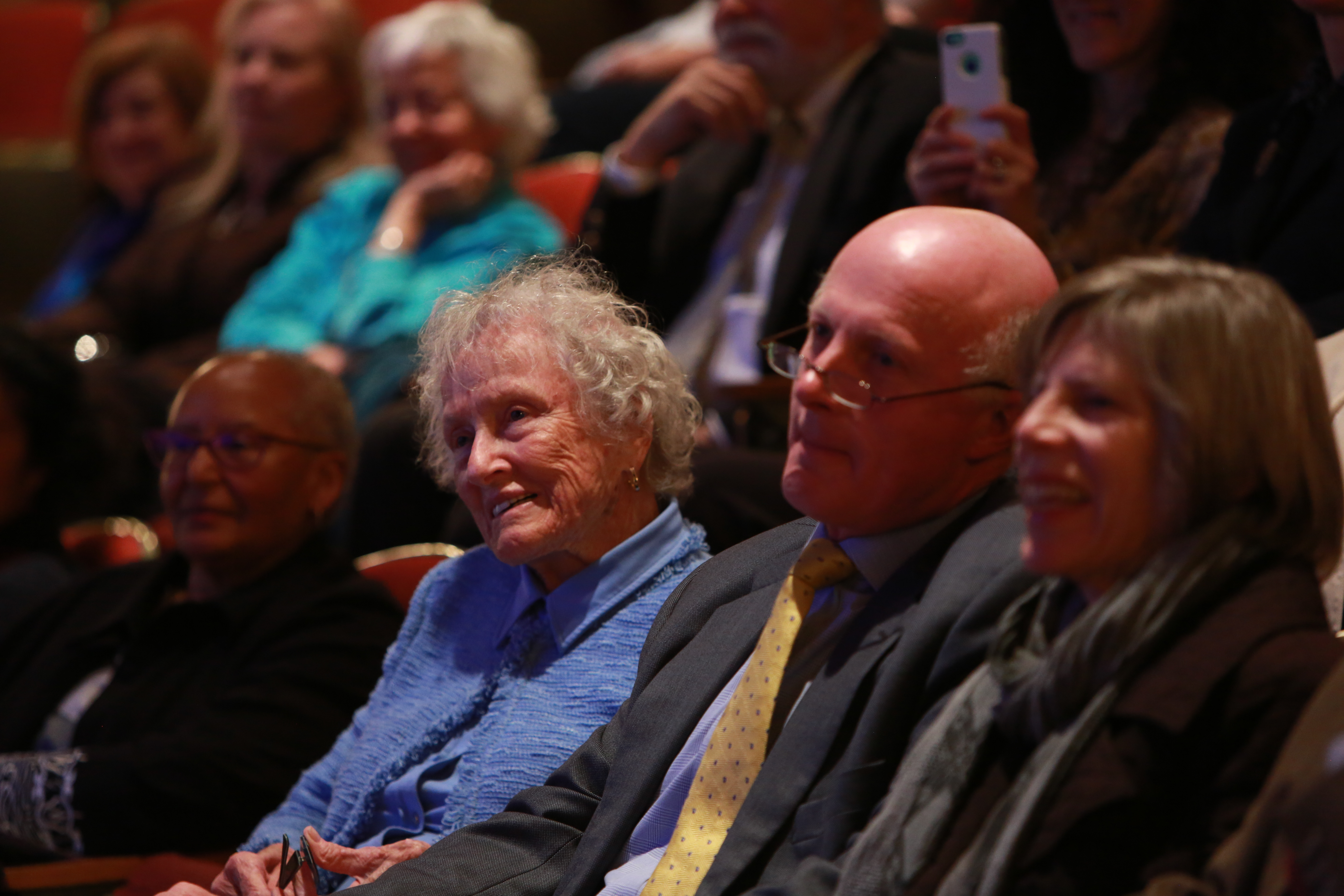 Evelyn Finnegan sitting in an audience