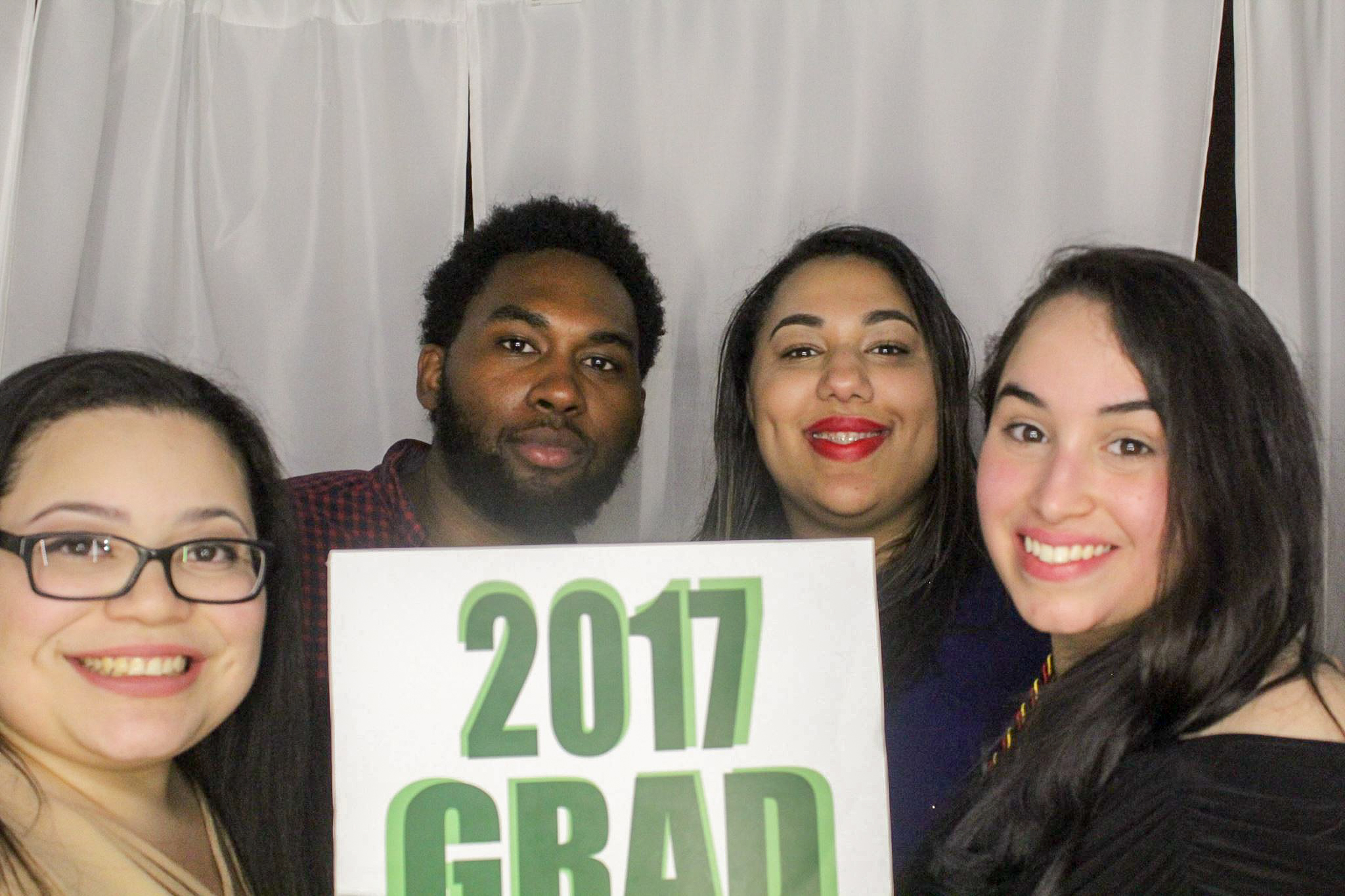 Cynthia Lopez, Mykael Tucker, Glorimi Dejesus and Yaritza Arana Ortega strike a pose in the Unity Gala photo booth.