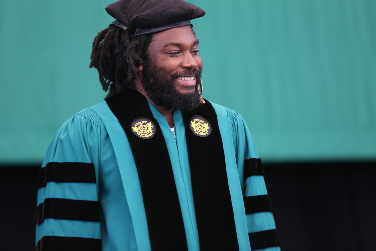 Jason Reynolds in regalia at Commencement 2018