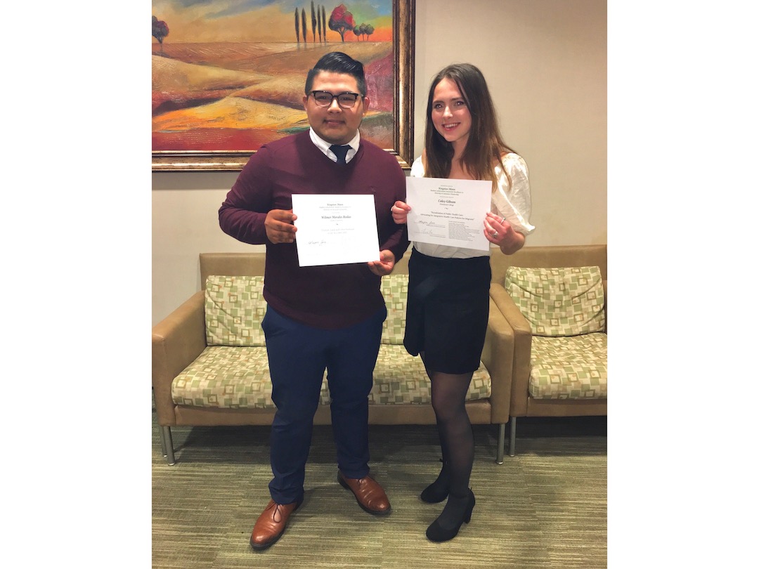 Two students receiving awards