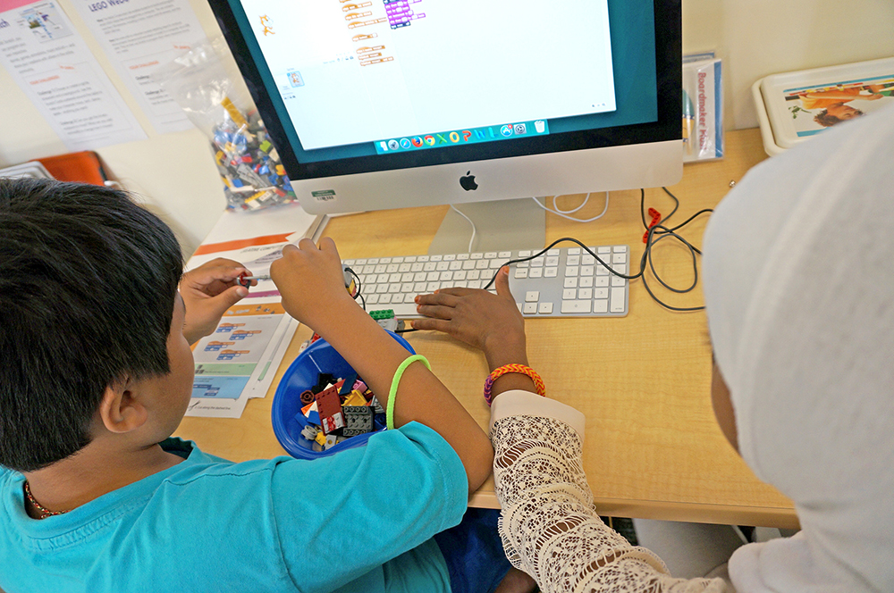 Young students working at a computer