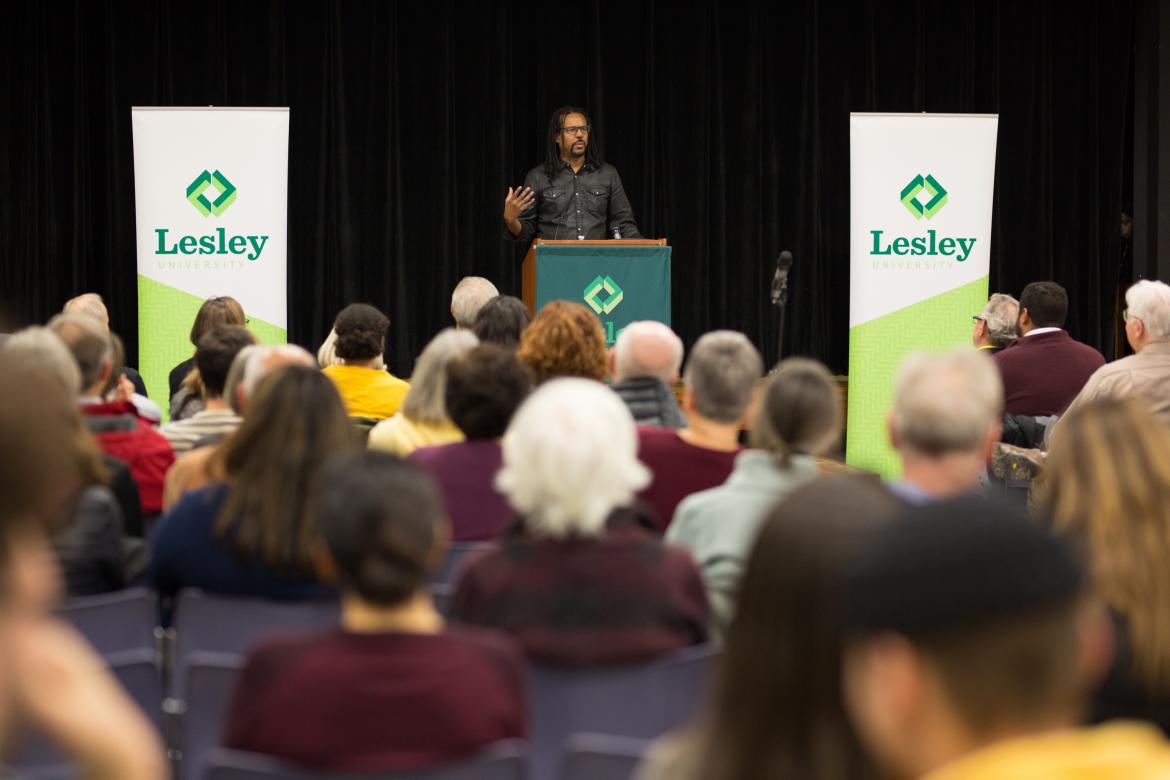 Colson Whitehead standing on stage in Washburn Auditorium