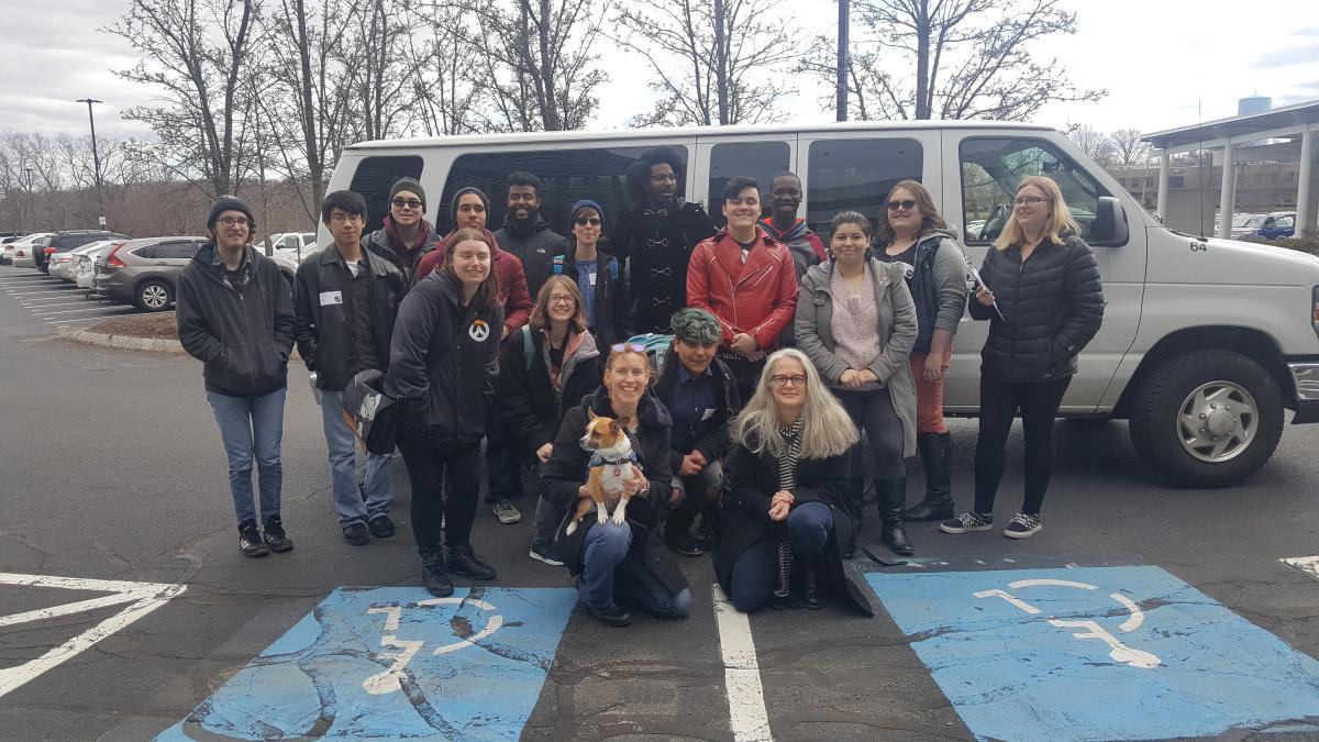 students outside in the parking lot before at the New England Student Game Design Showcase