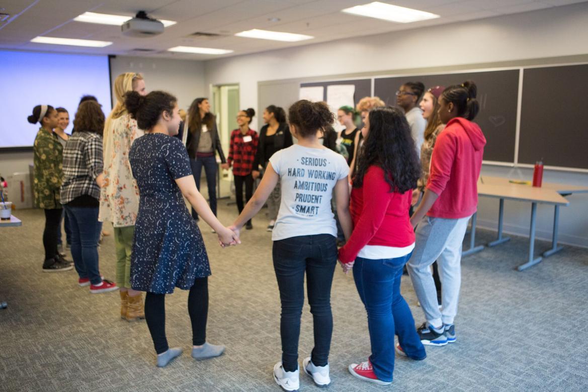 Girls standing in a circle